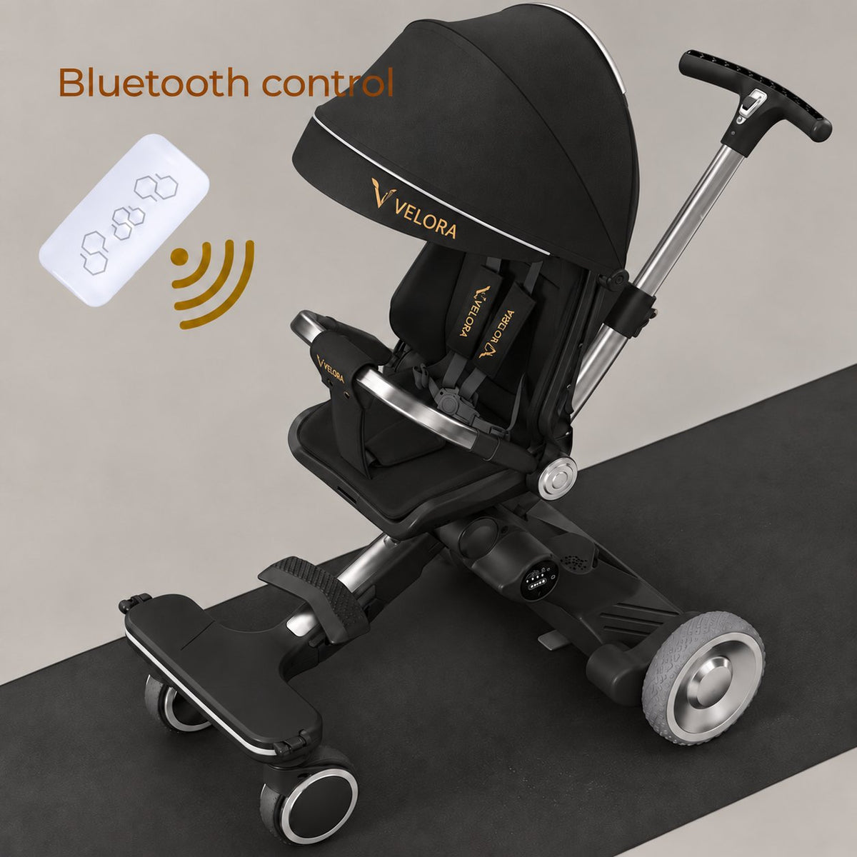Black VELORA Electric Stroller with its remote control for the electric movement